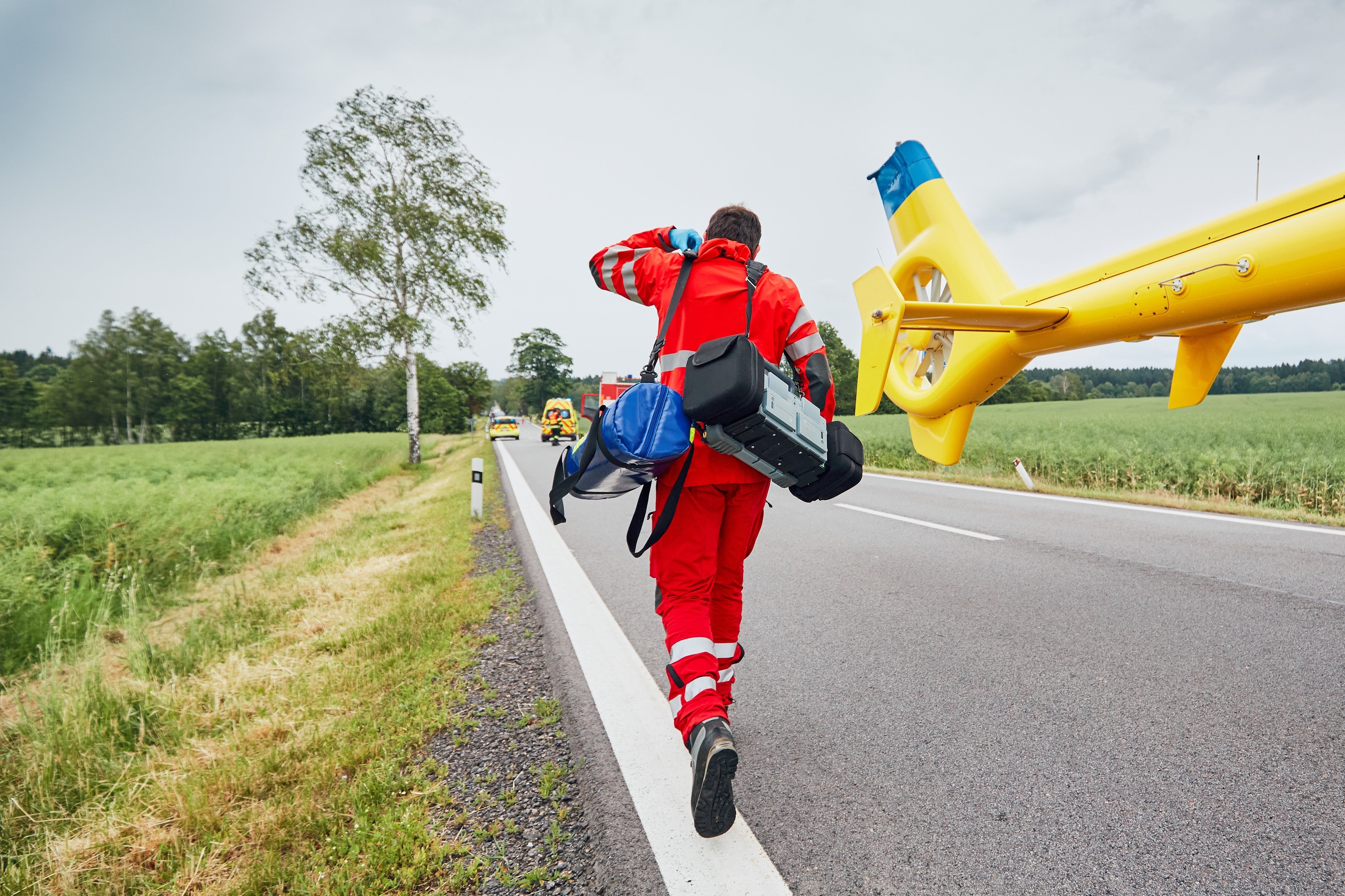 EMS professional near a plane