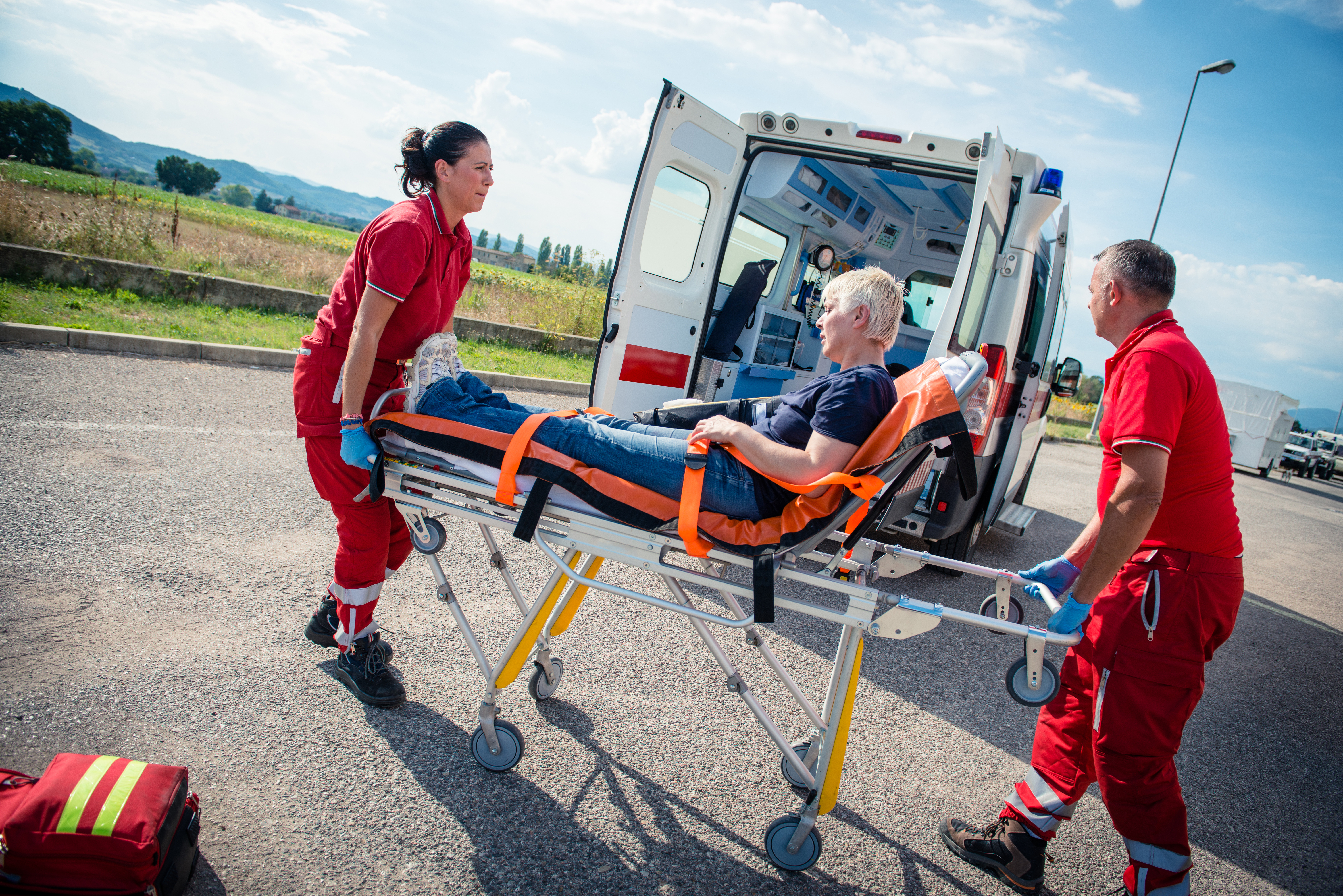 EMS team providing first aid on the street