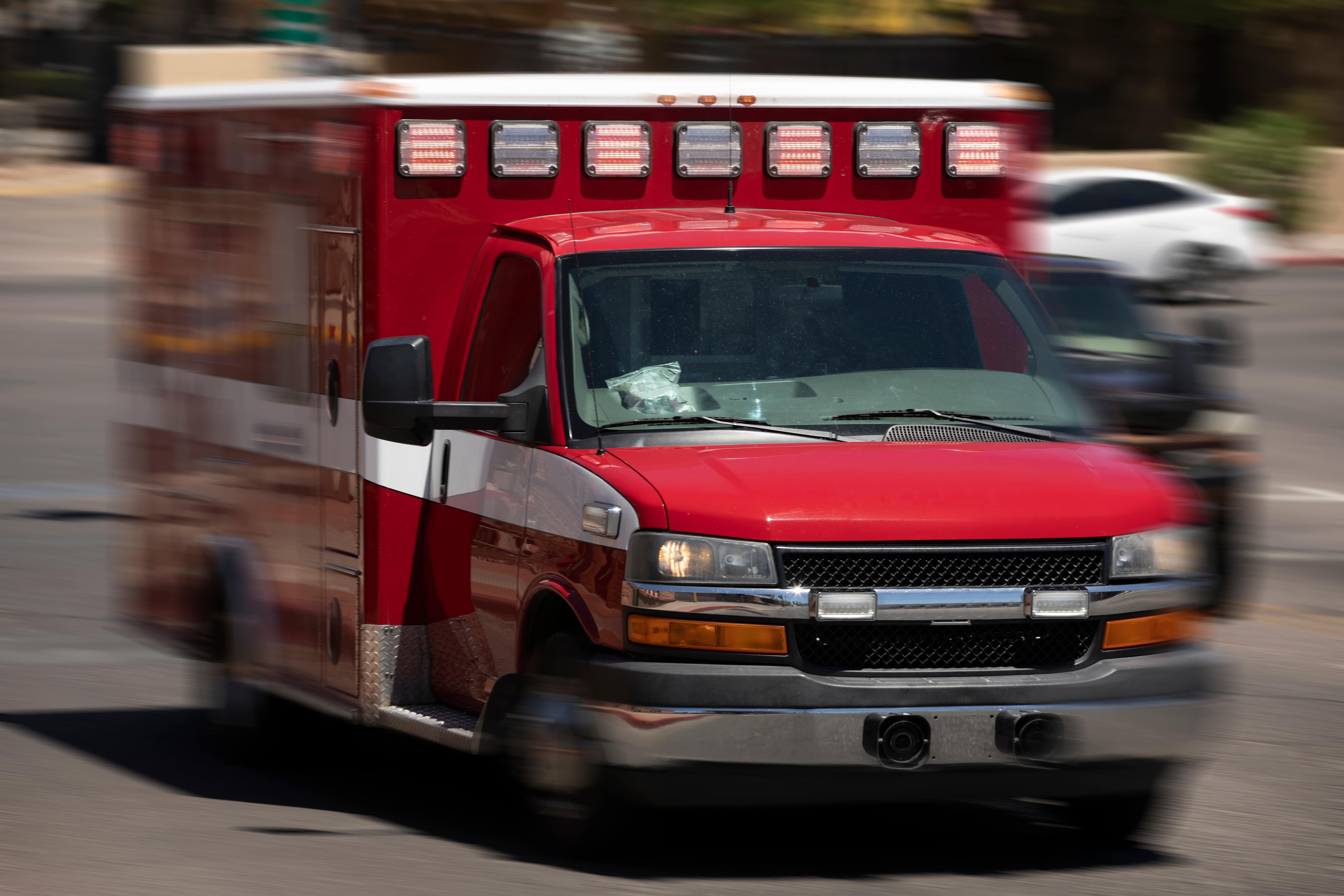 Blurred ambulance in motion responding to a call